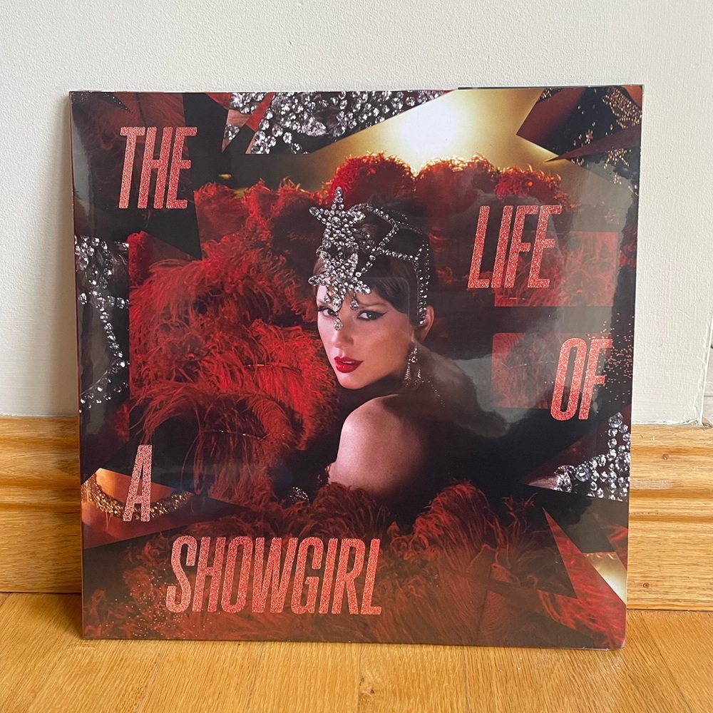 The Life of a Showgirl: Tiny Bubbles in Champagne Edition (Red Lipstick Vinyl)